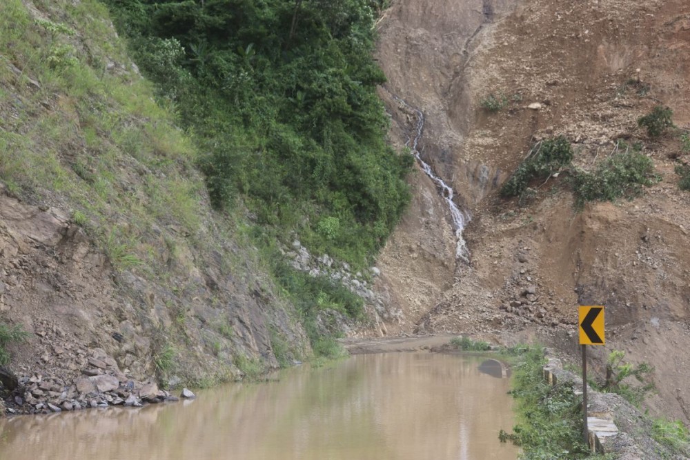 A landslide-hit stretch of NH-702A between Satakha and Kilomi village on August 6, where restoration work is underway following continuous rainfall.